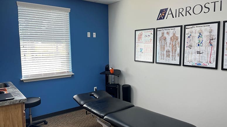 A look inside the treatment room at Airrosti Conroe, where patients will work with their Airrosti Certified Provider to identify and treat the source of their pain.