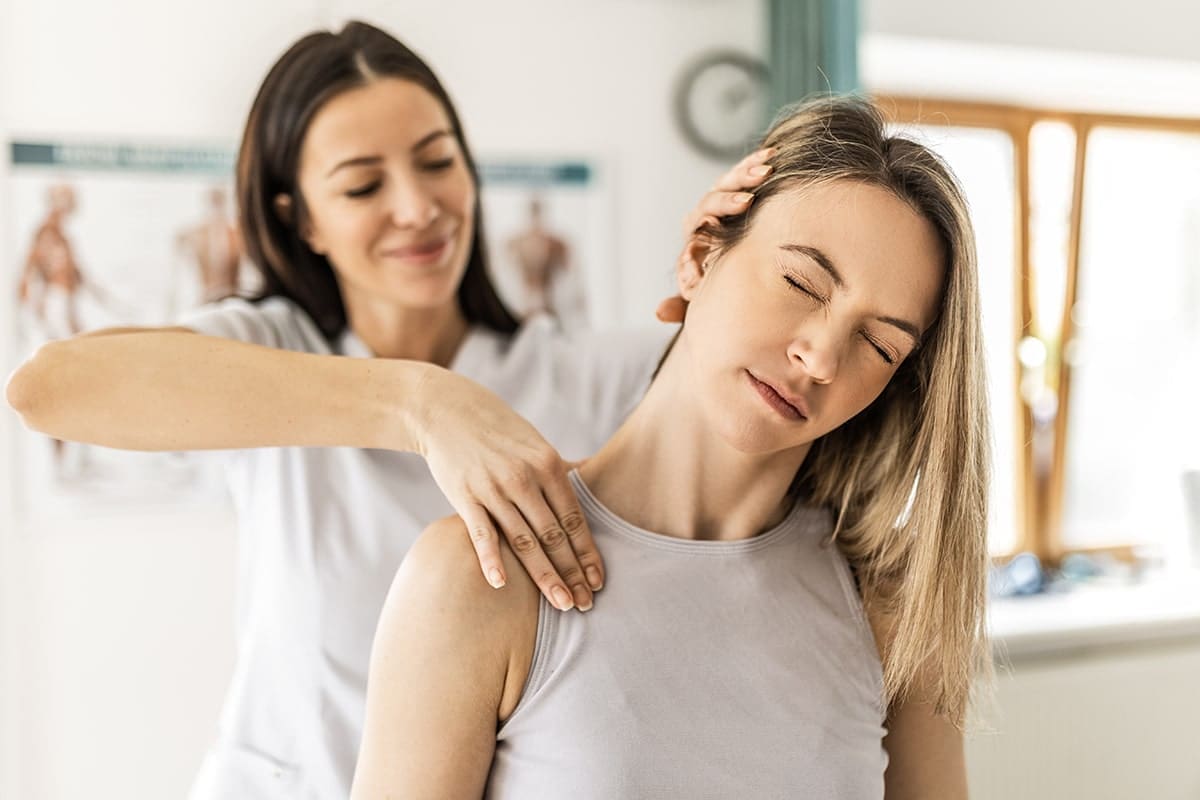 Woman being treated for neck pain
