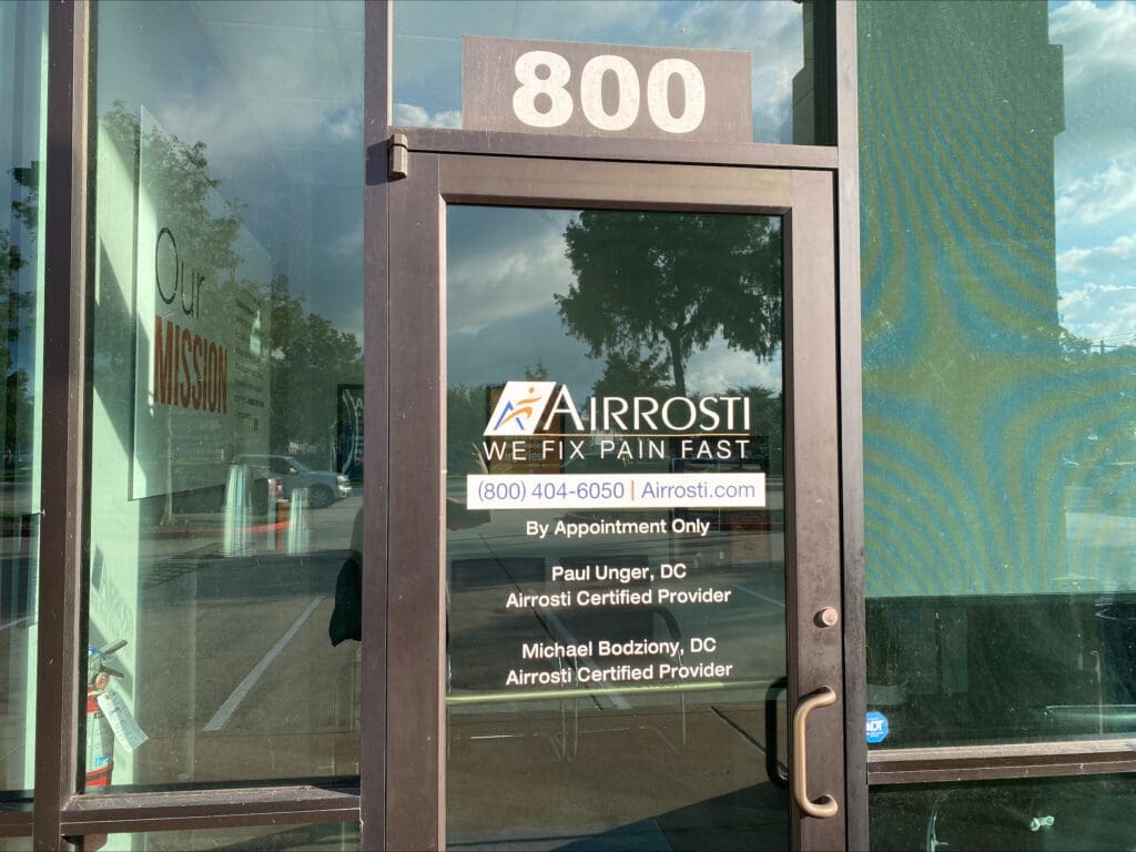 The exterior front door at Airrosti Tuscan Lakes