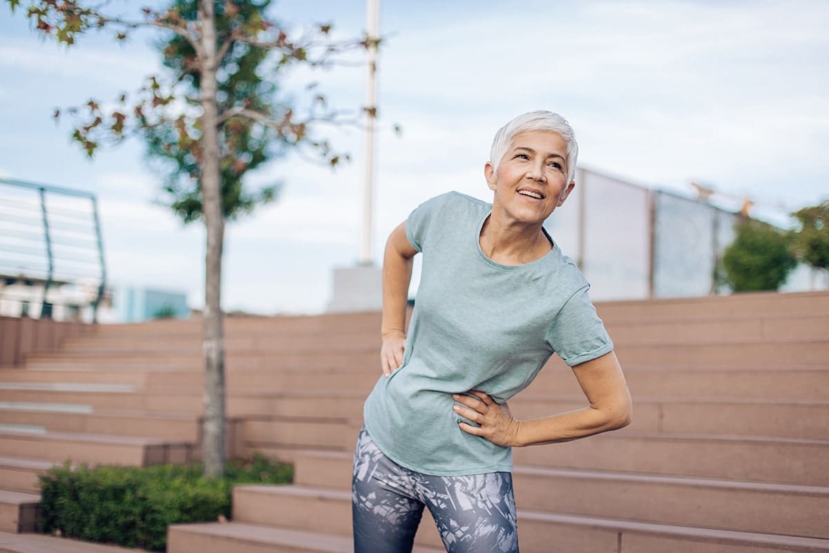 Woman stretching her hip