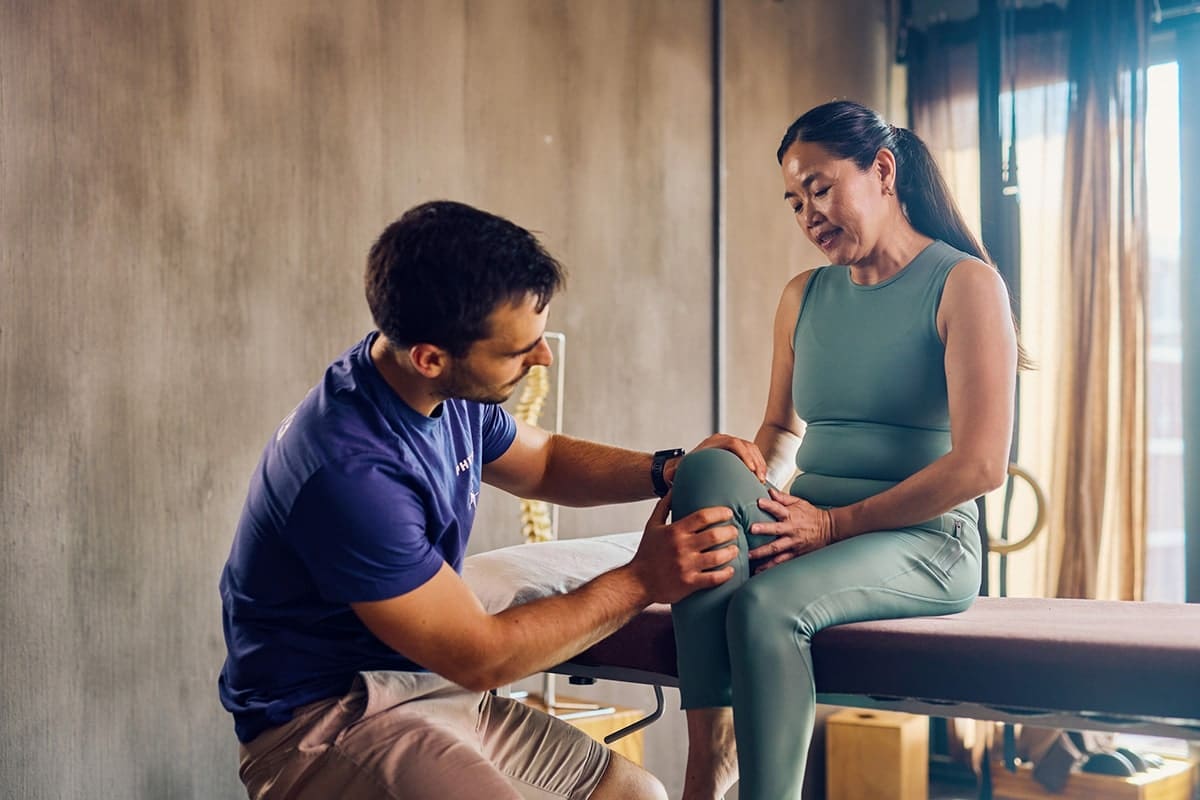 Woman being treated for knee pain