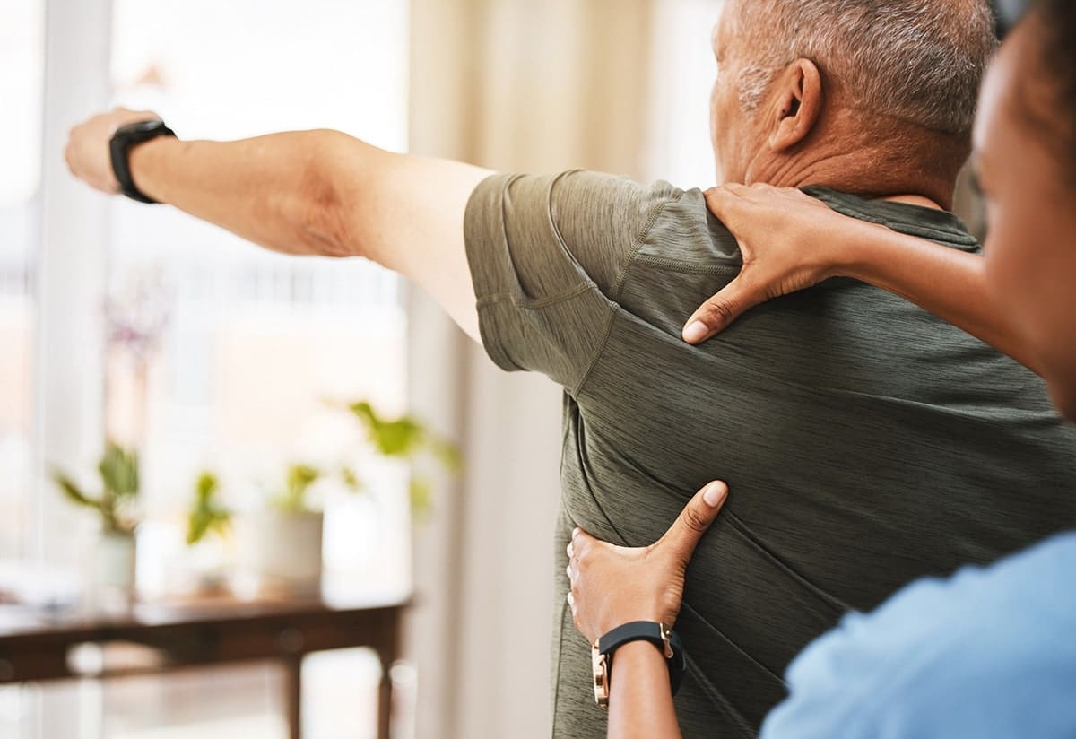 man getting treated for shoulder pain