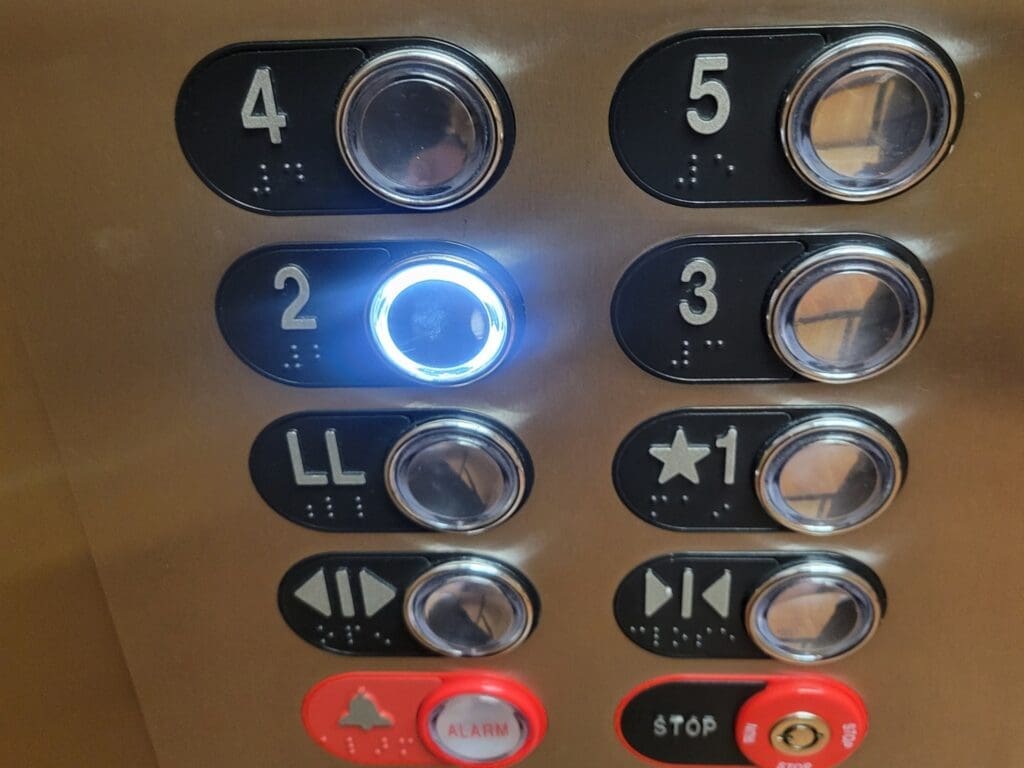 Elevator buttons at Airrosti Abilene. Floor 2 is highlighted.